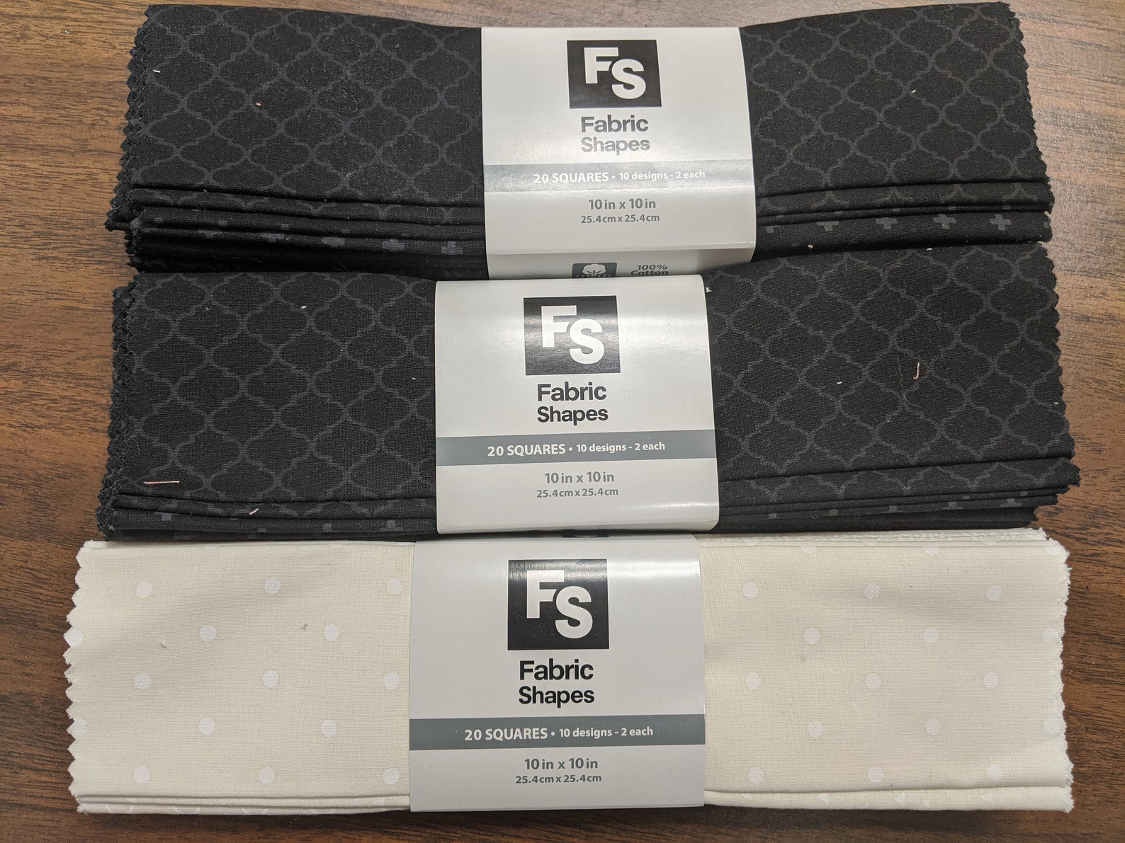 10x10 fabric squares from Joann's 2 Black and 1 White Etsy