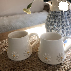 The daisy mugs in action.