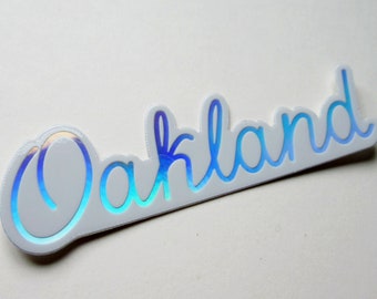 Oakland Holographic, Water Bottle Sticker Laptop Stickers Decal Small Gifts Dimensions 3.44" x 1"