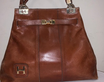 Vintage Leather Handbag / Purse / H-Symbol details the front and top of front handles.