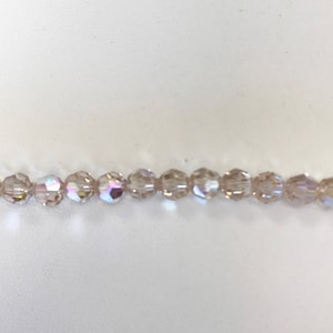 5000 Swarovski® 6mm Round - Light Silk AB - 12 pieces