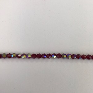 5000 Swarovski® 4mm Round - Siam- 24 pieces