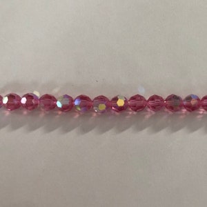 5000 Swarovski® 6mm Round -Rose AB - 12 pieces