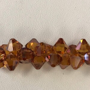 6301 Swarovski® Top drilled 8mm Bicone - Copper - 20 pieces