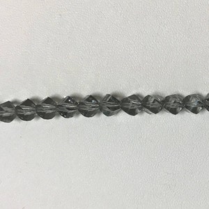 5020 Swarovski® 6mm Helix - Black Diamond - 12 pieces