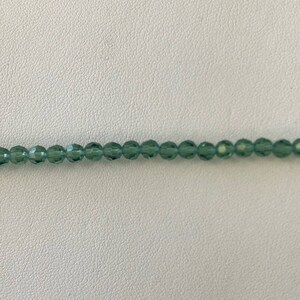 5000 Swarovski® 4mm Round - Erinite - 24 pieces