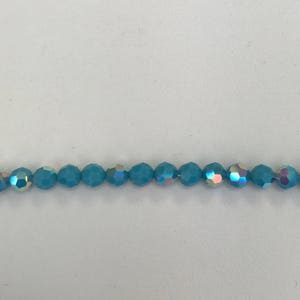 5000 Swarovski® 6mm Round - Turquoise AB - 12 pieces
