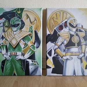 May include: Two paintings of Power Rangers characters. The left painting features the Green Ranger with his Zord, the Dragonzord. The right painting features the White Ranger with his Zord, the Tigerzord.