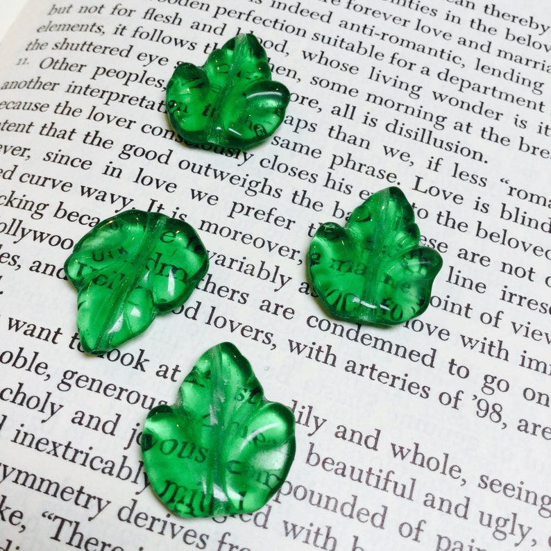 #722 - 24 Pieces center-drilled Transparent Pressed Glass Leaves in Green