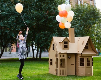 Playhouse. Cardboard playhouse. Creative Crafts Playhouse for kids. The best toy for creative children