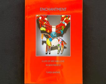A Book by Turza Shows, "Enchantment" has 280 color photos and details my life as a jeweler for 50 years, collaborating & traveling with Andy
