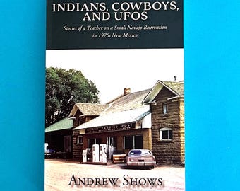 A softcover book by Andrew Shows, "Indians, Cowboys, and UFOs", 100 Short Stories about Teaching on the Navajo Reservation in 1970s NM