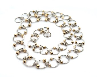 Collar de eslabones de círculo abierto entrelazados graduados de oro amarillo de 10 k de plata de ley
