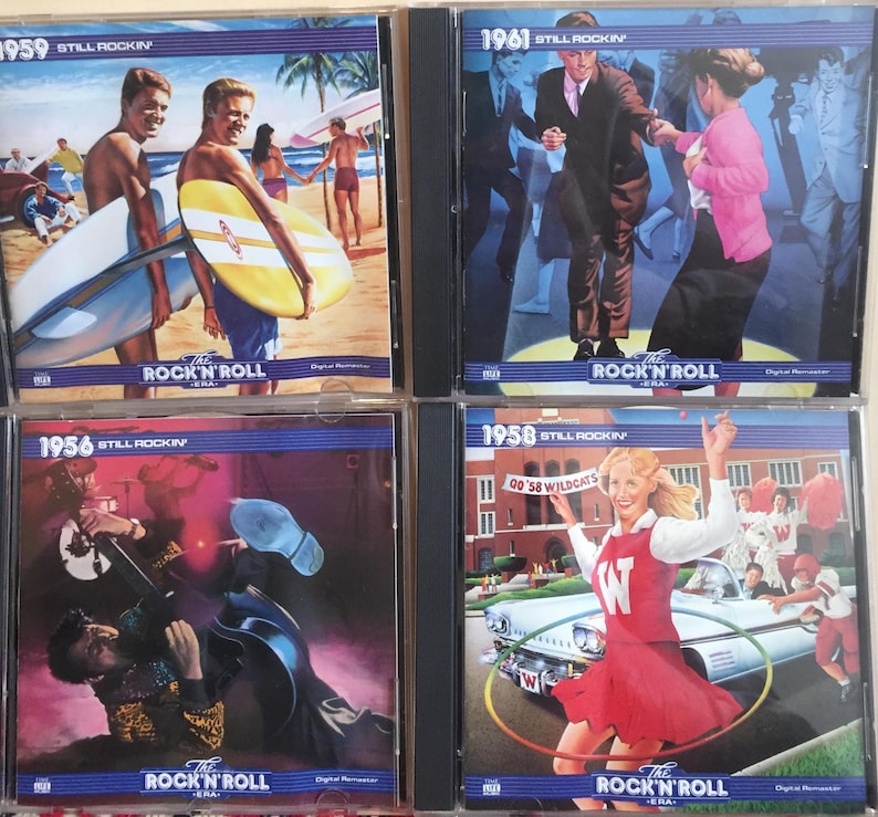 May include: Four CD cases featuring vintage artwork. The covers display scenes from the rock and roll era, including surfers, dancers, and a classic car. Each case has the text "The Rock 'N' Roll Era" and a year.
