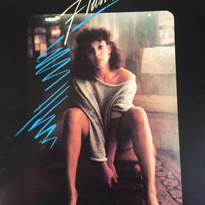 May include: A rustic wooden sign with the text "Welcome to our home" in white lettering. The sign features a distressed finish and a simple, inviting design, perfect for entryway decor.