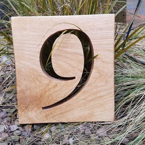 Hand made oak house number
