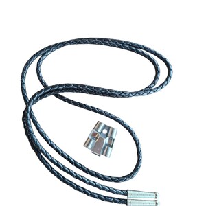 May include: A black leather bolo tie with a braided design. The tie features silver-colored metal tips and a silver-colored metal slide. The bolo tie is displayed against a white background.