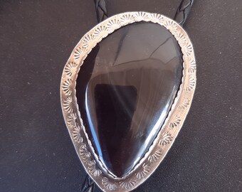 Custom bolo tie, black obsidian hand cut and polished rock, set in custom design silver.