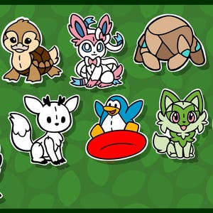 May include: A collection of ten individual die-cut stickers featuring various stylised cartoon creatures, including a green cat, a brown turtle, a pink and white fox-like character, a brown rock-like figure, an orange dog, a black moth, a white fox, a blue penguin, a green fox, and a dark purple creature.