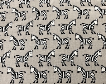 Fabric cotton, zebras on grey background