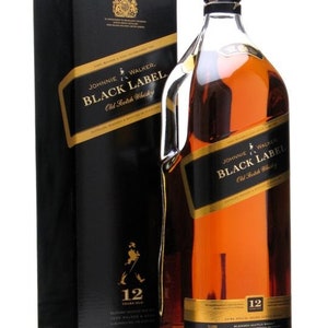 May include: A bottle of Johnnie Walker Black Label 12 year old blended Scotch whisky. The bottle is clear glass with a black label and gold lettering. The label features the Johnnie Walker logo and the words "Black Label" and "Old Scotch Whisky". The bottle is sitting on a white surface.