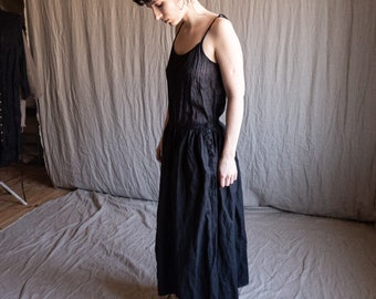 Black linen skirt MADICKEN. Crinkled flax skirt dark distorted raw hem womens skirt button fly vintage creases pleats dark gothic old