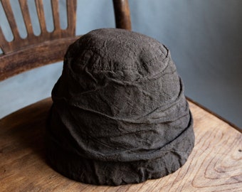 Greyish brown linen hat LAVA. Dark naturally dyed hand stitched eco friendly cap handmade minimalist japanese brimless wrinkled wabi sabi