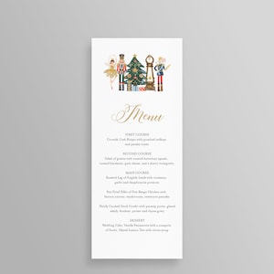 May include: A rectangular menu card with a festive Nutcracker theme. The top features illustrations of a ballerina, nutcrackers, a Christmas tree, and a clock. The menu lists courses like Cornish Crab Bisque and Roasted Leg of English Lamb.