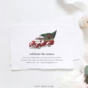 May include: A watercolor invitation with a red truck carrying a Christmas tree. The text "celebrate the season" is above the party details. The invitation is on textured white paper.