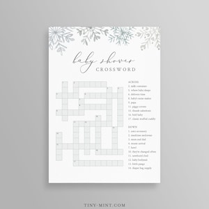 May include: A printable baby shower crossword puzzle with a light blue and grey watercolour snowflake design. The crossword puzzle has 17 clues, with the words "baby shower crossword" at the top.