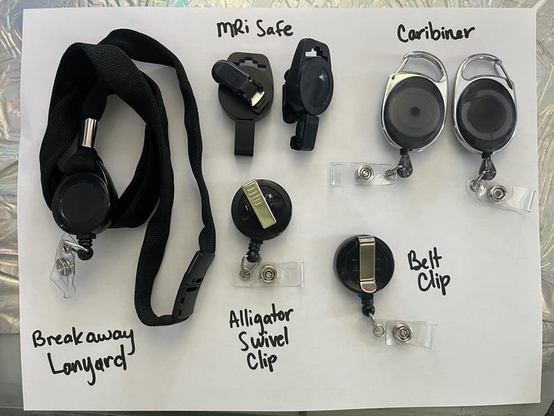 May include: A variety of retractable badge reels and lanyards, including a breakaway lanyard, an alligator swivel clip, a belt clip, a caribiner, and an MRI safe reel.
