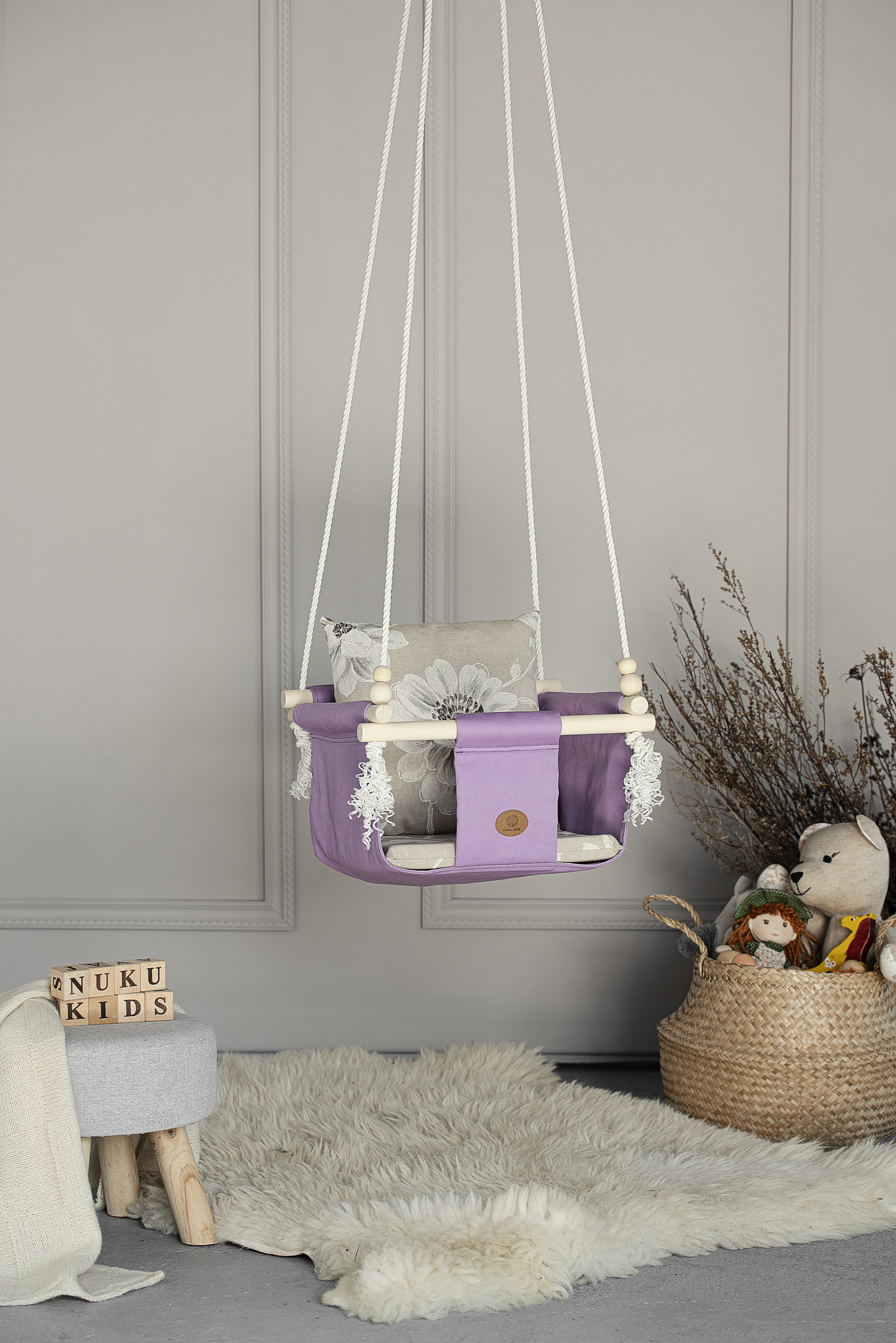 Purple baby swing top