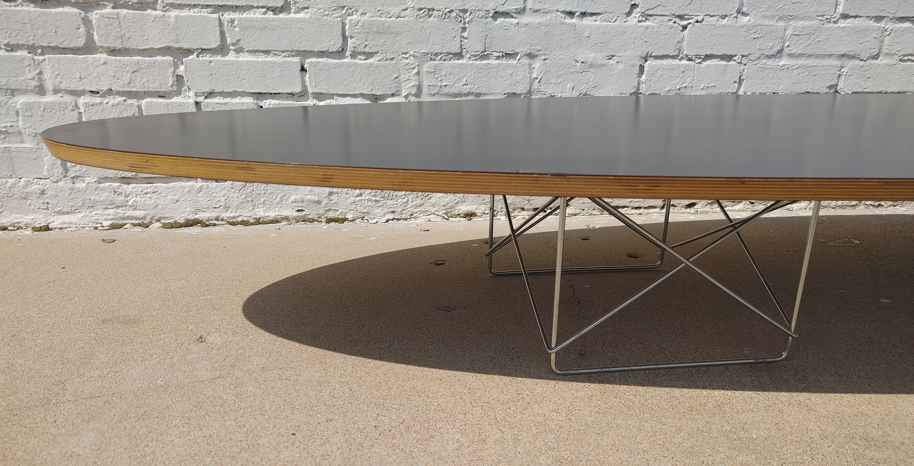 Eames oval coffee table deals