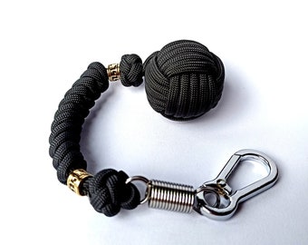 Monkey fist keychain, Braided paracord monkey fist key chain, brass bead, steel carabiner