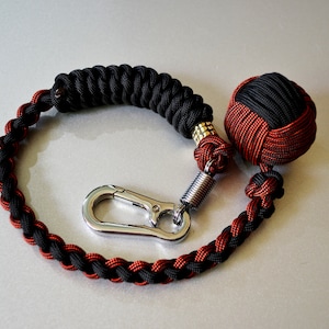 Monkey fist keychain, Braided paracord monkey fist key chain, brass bead, steel carabiner, grey