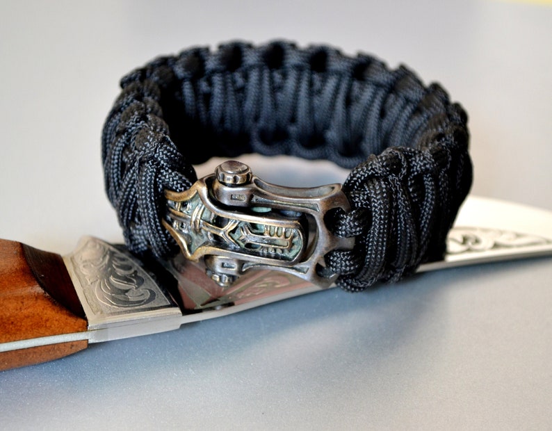 Mens black paracord bracelet with unique brass shackle/clasp Etsy