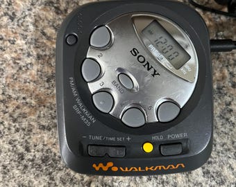 Vintage Sony Walkman Am Fm with earbuds