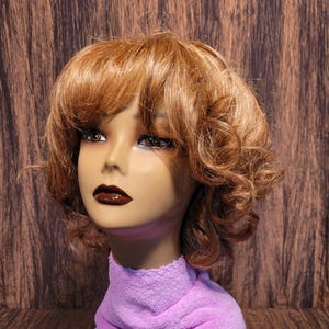 Short Wavy layered medium strawberry blonde wig