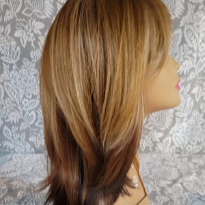 Motown Tress Futura medium length strawberry blonde ombre wig