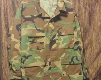 Military issue camouflage jacket, size large