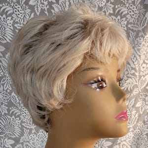 Eva Gabor Light blonde short layered cut wig