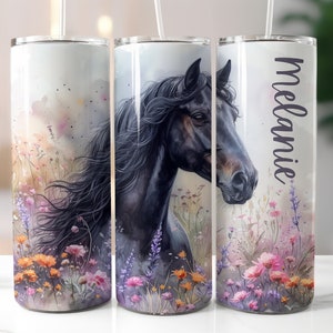 May include: A stainless steel tumbler with a black horse and floral design. The tumbler has a straw and the name "Melanie" is printed on the side.