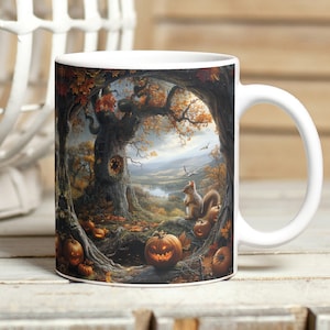 May include: White ceramic mug with a Halloween-themed design. The design features a large tree with a hollow trunk, a squirrel, and pumpkins. The background is a forest scene with fall foliage.