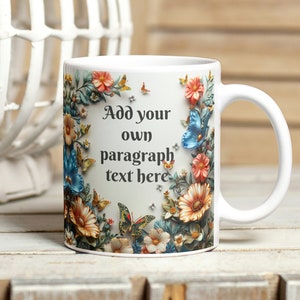 May include: White ceramic mug with a floral design featuring butterflies and the text "Add your own paragraph text here".