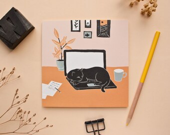 Postcard Sleeping Cat on a laptop