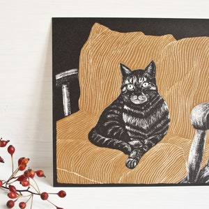 Gatto da cartolina sul cuscino, illustrazione