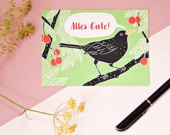 Carte postale Bonne chance, illustration animalière merle
