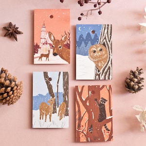 Ensemble d'étiquettes cadeaux représentant des animaux de la forêt, avec des illustrations pour Noël