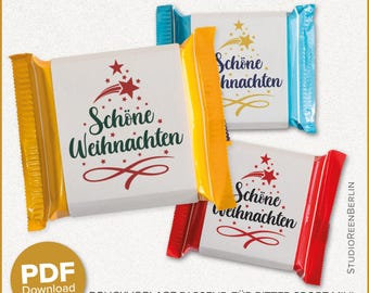 Op de afbeelding: Drie chocoladereepverpakkingen met de tekst "Schöne Weihnachten" in groen en rood, en een kerstboomontwerp. De verpakkingen zijn geel, blauw en rood. De afbeelding bevat ook de tekst "PDF Download".