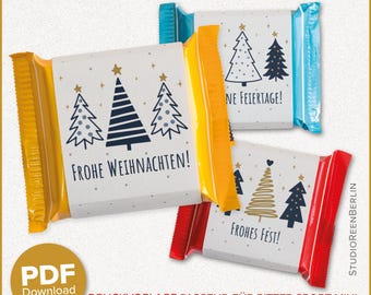 May include: Three wrapped candy bars with Christmas tree designs and the phrases "Frohe Weihnachten!" and "Frohes Fest!" in German. The wrappers are white with gold, blue, and red accents. The image also includes the text "PDF Download".
